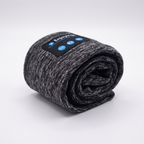Sleep band rolled up to show how small it packs